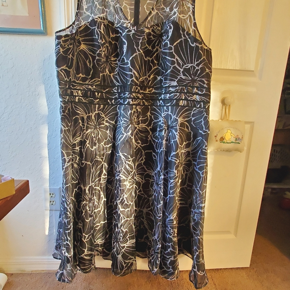 Party dress Roman's 32 W black with silver flowers.Sheer top, lined bodice/skirt